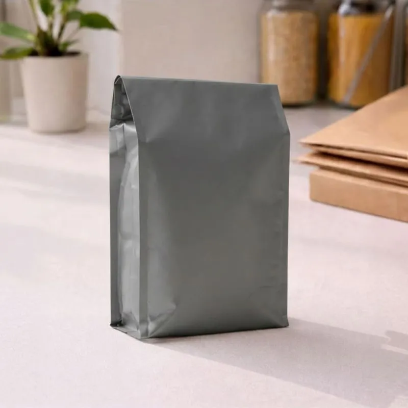 Plain grey pouch standing on a kitchen counter.
