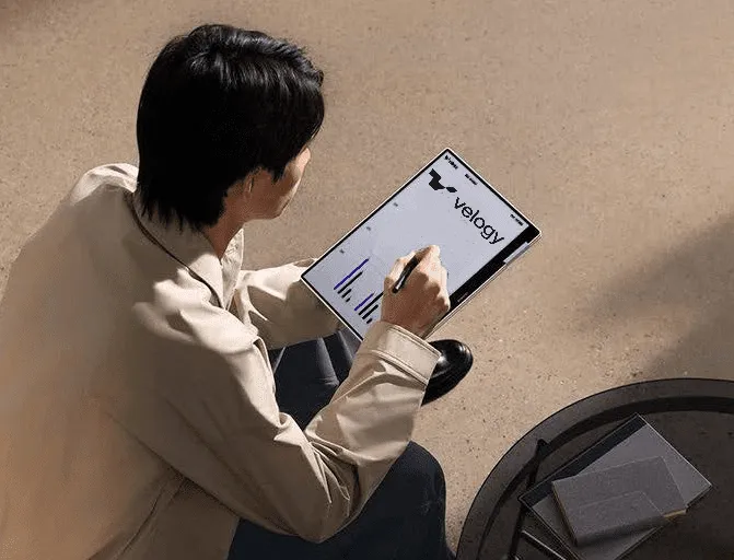 Man looking at a tablet