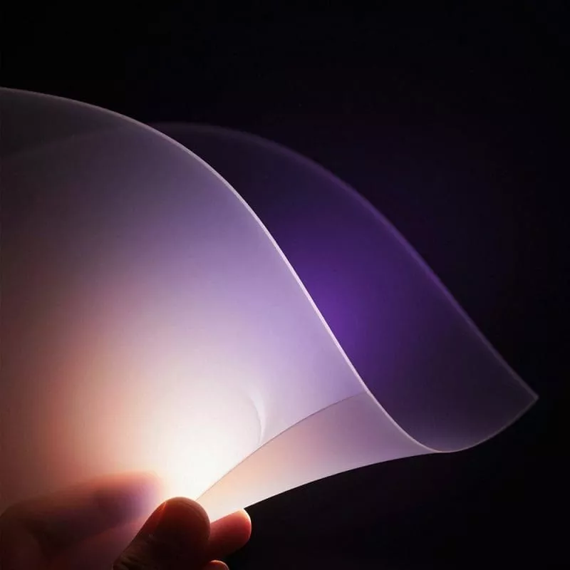 Translucent material being held up to a source of light